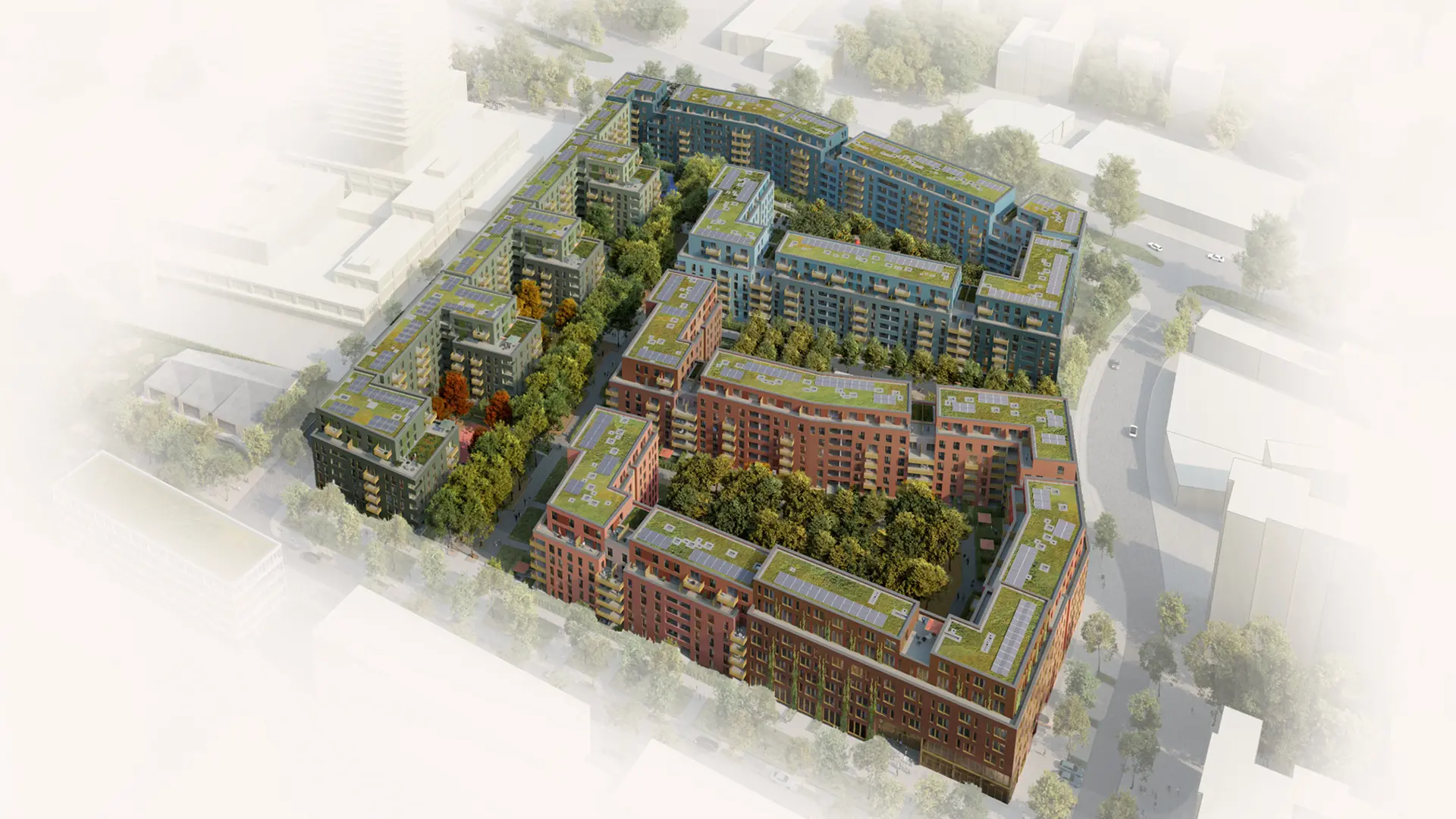 Luftbild-Visualisierung des fertiggestellten Quartiers „Die Welle Köln“ mit begrünten Dächern, modernen Wohn- und Gewerbeflächen und zentralen Grünbereichen.